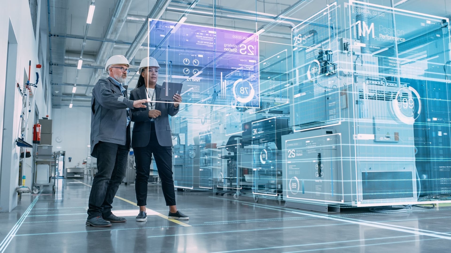 Two software engineers working in a high-tech laboratory, collaborating on a monitor to develop and fine-tune solution for a manufacturing industry