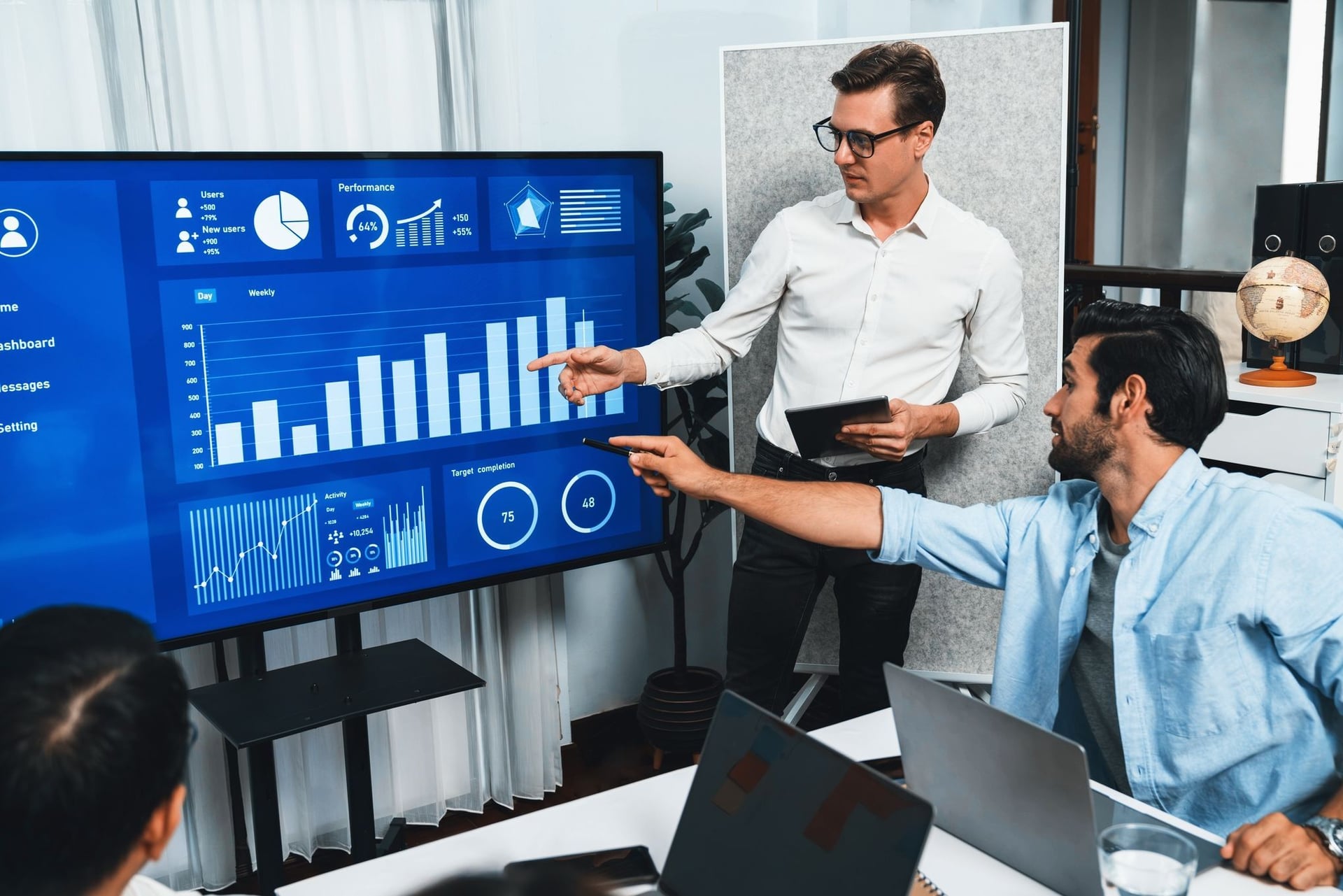 Group of Data Analyst analyzing data to find the best solution