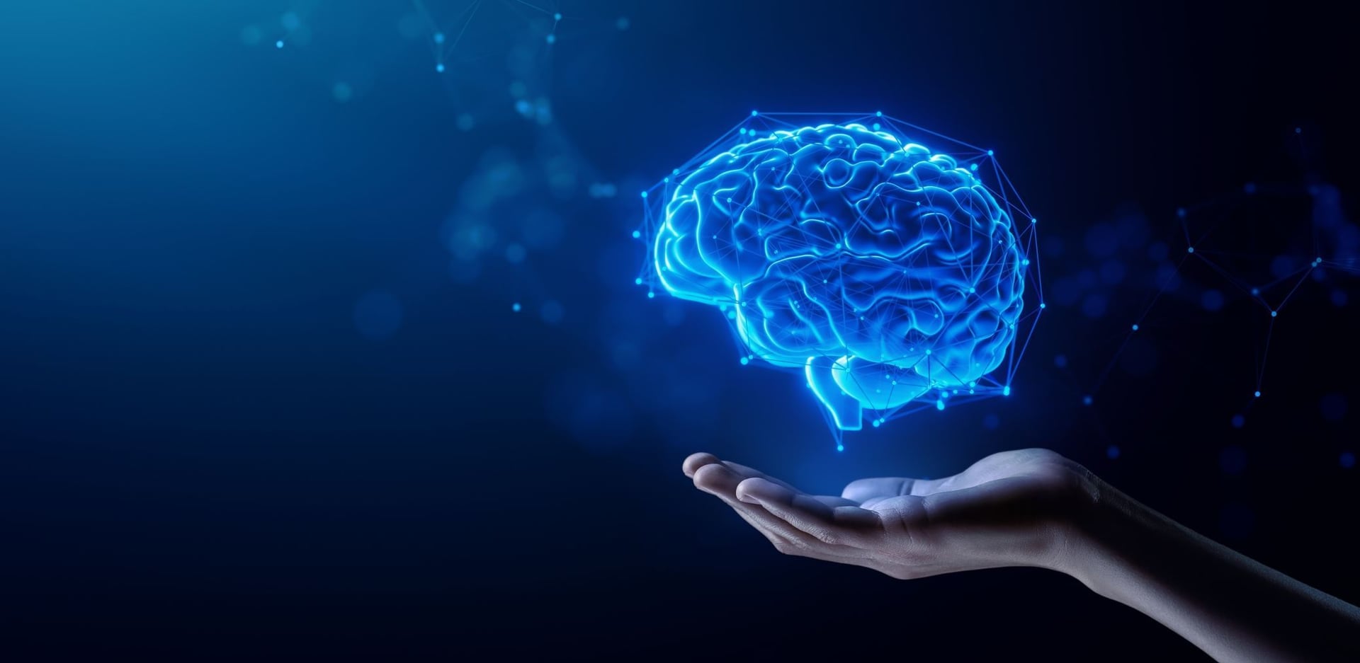 Hand Holding a brain representing Ai and how can easily be integrated