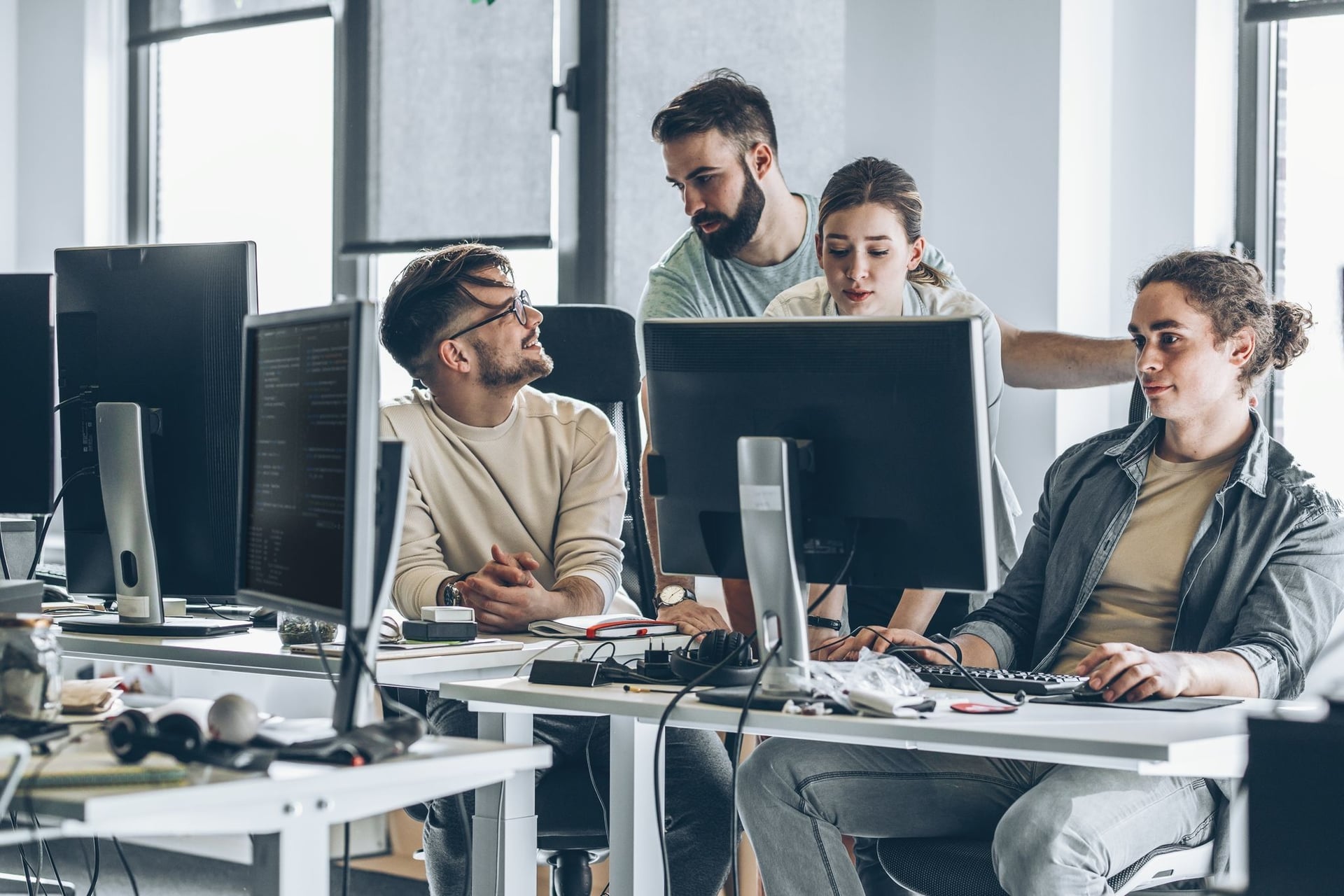Group of Software Engineers working together to deliver a Custom Ai solution